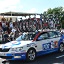 A support car carrying team bikes